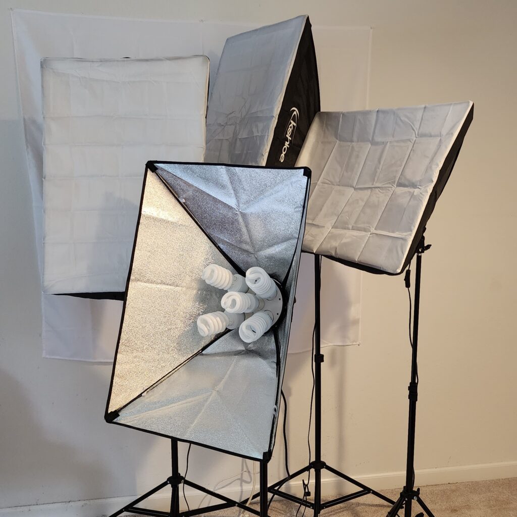 Four CFL soft box lights on stands